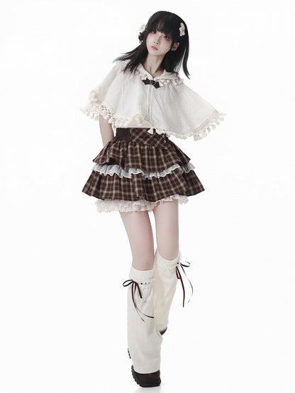 リボンのアクセント付きホワイトニットレッグウォーマー（ブラウン）