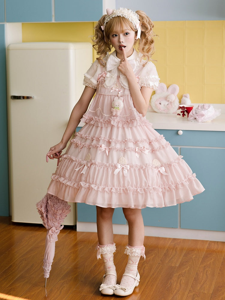 Süßes Lolita-Kleid mit rosa Schleifenakzenten und Rüschenbesatz
