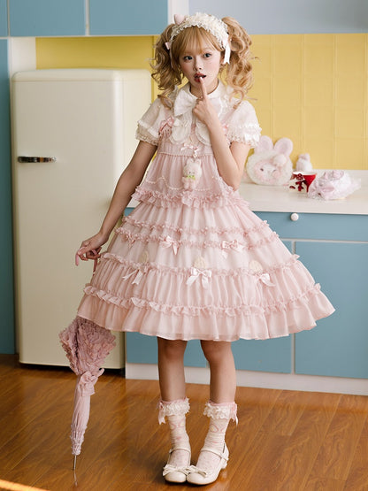 Süßes Lolita-Kleid mit rosa Schleifenakzenten und Rüschenbesatz