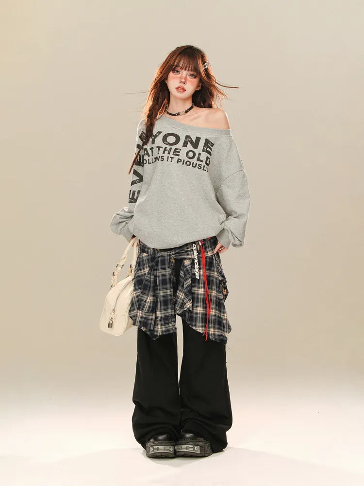 Schwarze karierte Hose mit weitem Bein und