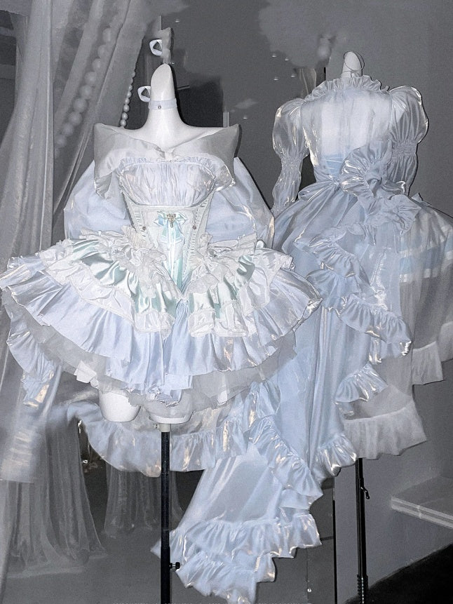 フリル付きロング丈トップス、袖はシアー、裾はカスケーディングヘム、ブルー