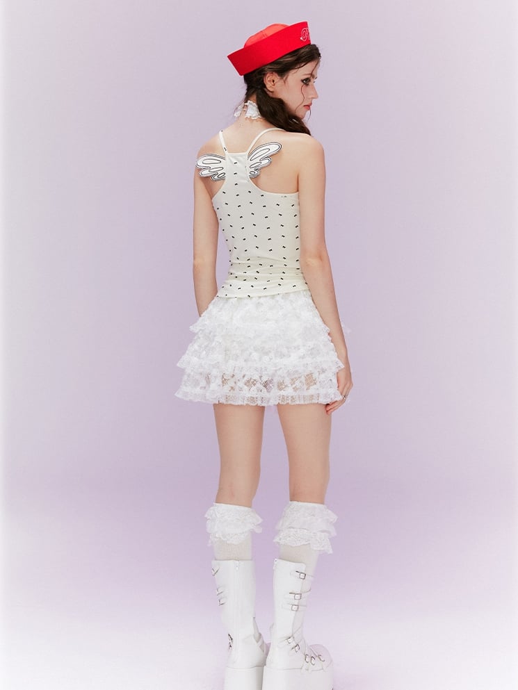 ベージュ オールオーバーデザイン バックキャミトップ 蝶結びプリント ウィング