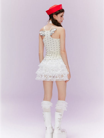 ベージュ オールオーバーデザイン バックキャミトップ 蝶結びプリント ウィング