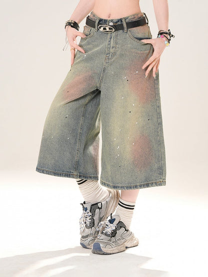 ブルーのローライズ ダメージ加工 スパンコールディテール ストレートレッグジーンズ