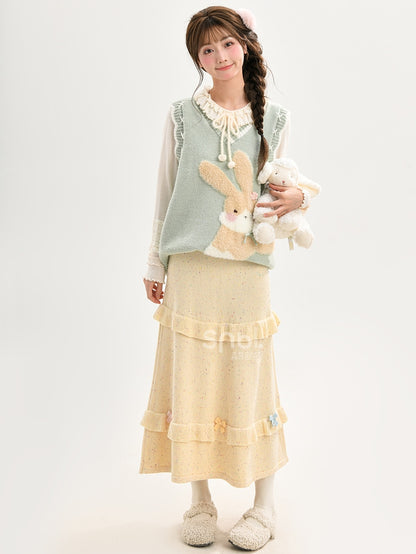 イエローのリボンがアクセントのハイウエストニットミディ丈スカート