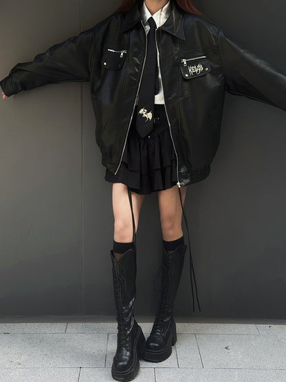 パンクなブラックメタル文字があしらわれたモトジャケット