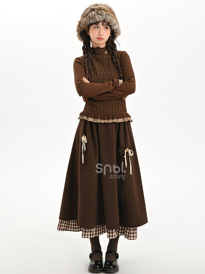 ブラウンの蝶結びディテール、足首丈スカート、チェック柄、フリル裾