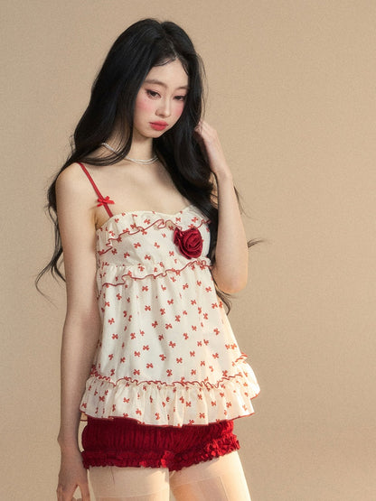 Aprikosenfarbenes Camisole mit Rüschen und rotem Schleifenmuster