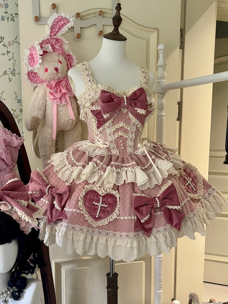ピンクの蝶結びとハート型のアップリケスカートのスイートロリータドレス