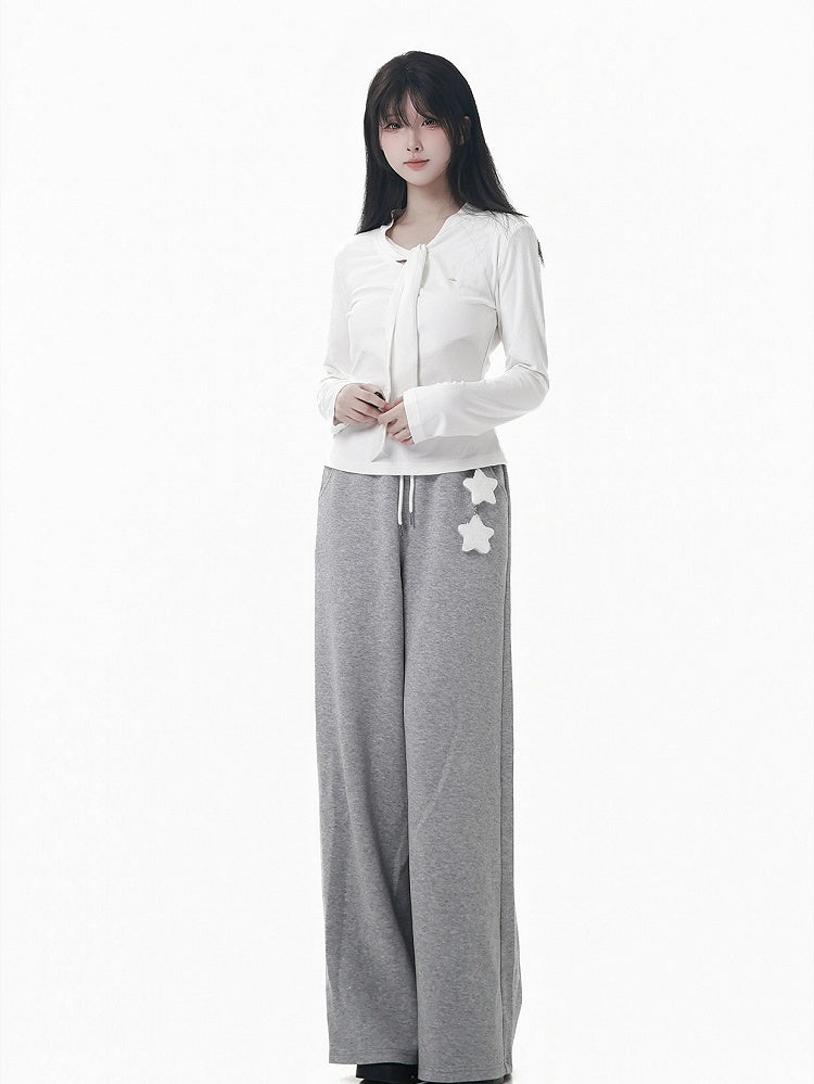 Haut long blanc/gris à nouer au col avec manches et taille cintrée