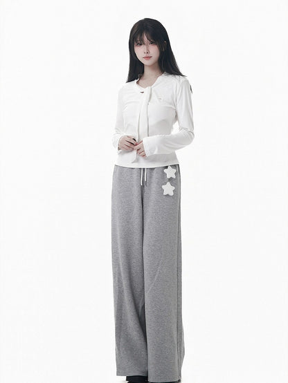 Haut long blanc/gris à nouer au col avec manches et taille cintrée