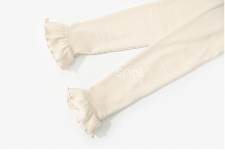 Aprikosenfarbenes, langärmliges Oberteil mit Spitzenbesatz und Schleifendetails