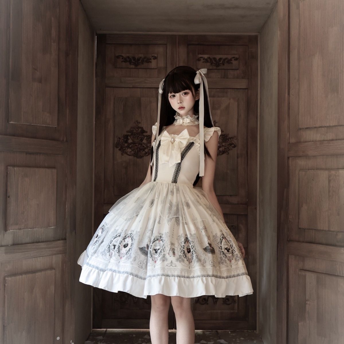 Model wearing ivory white Midnight Ballet Gothic Lolita JSK