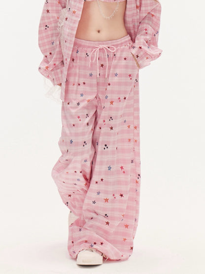 ピンクの星柄ドローストリングウエストワイドレッグチェックパンツ