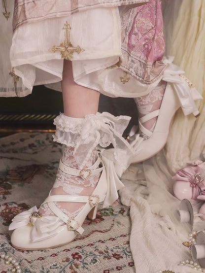 デザイン：ハートにクロスビーズ、トップチャーム、ホワイトリボン