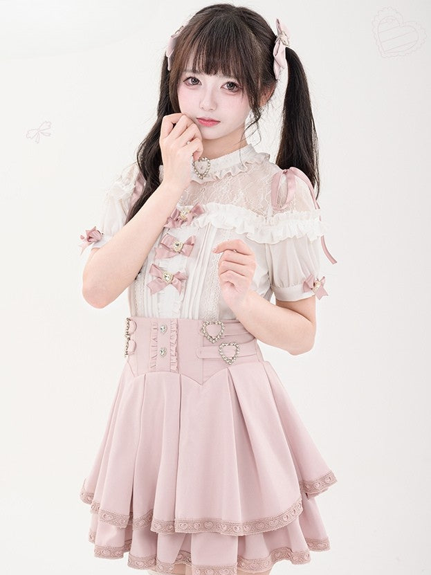 蝶結びのショート丈ジライラインストーンシャツプリーツピンクのディテール袖装飾ケイハート