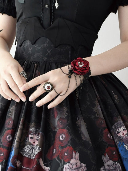 目玉リング付き黒と赤のブレスレット