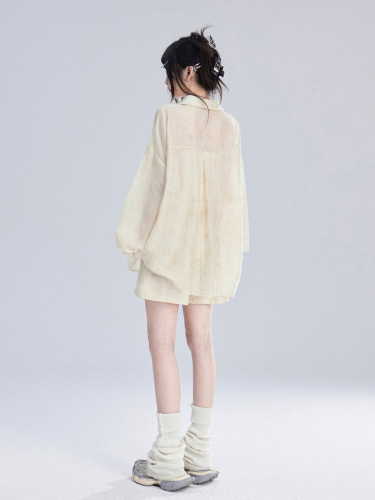 Aprikosenfarbenes, halbtransparentes Sonnenschutz-Shirt/lockere Shorts