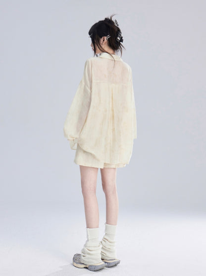 Aprikosenfarbenes, halbtransparentes Sonnenschutz-Shirt/lockere Shorts