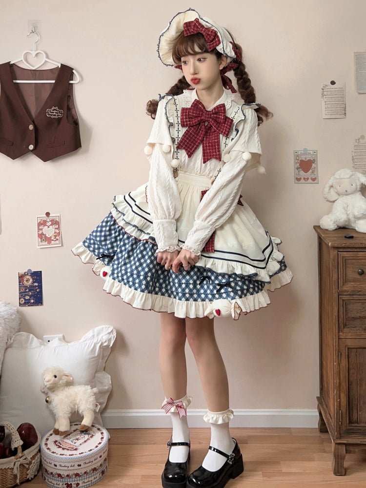 Cremefarbene Haube mit roter Schleife