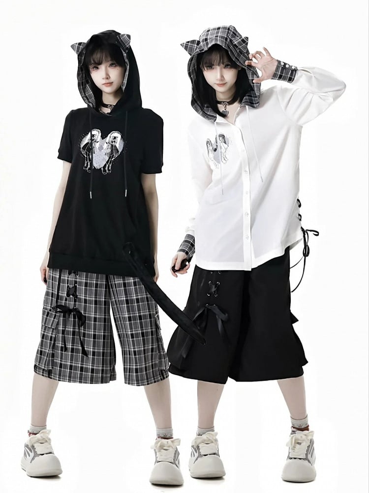 レースアップディテールのワイドレッグショーツ、ウエストはブラック/チェック柄、伸縮性あり