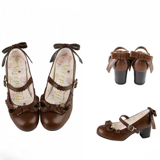 メアリー・ボウで飾られたハートブラウンのトップジェーン