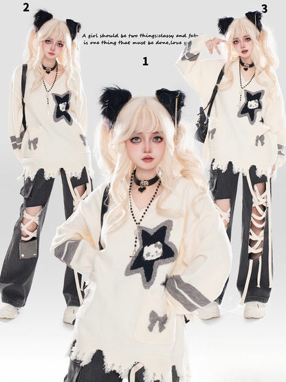 アプリコットキティとスターのディストレストリムVネックセーター