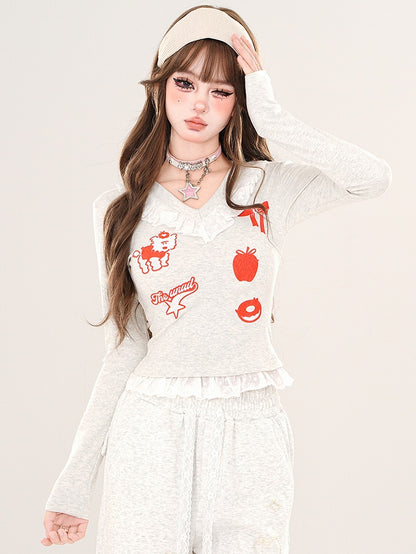 Schwarz/Graues Cartoon-Top mit V-Ausschnitt und Spitzenbesatz