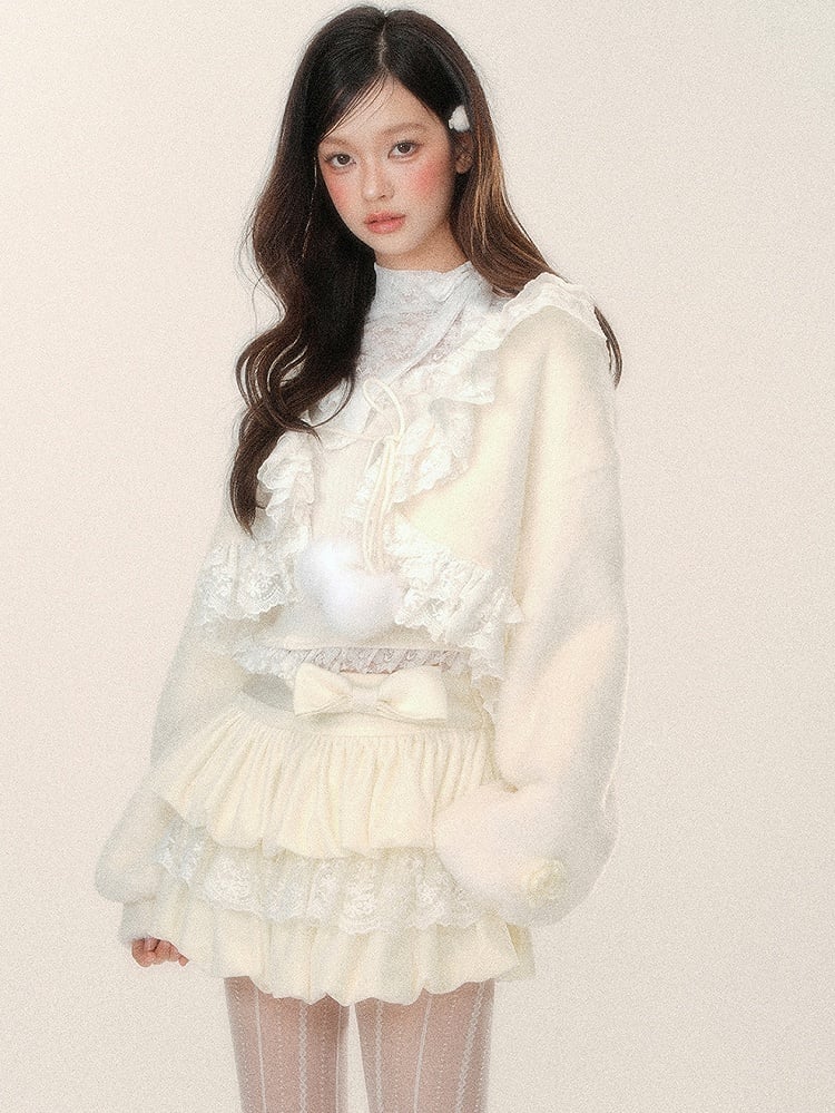 Aprikosenfarbener kurzer Plüsch-Cardigan mit selbstbindenden Trägern und Spitzenbesatz