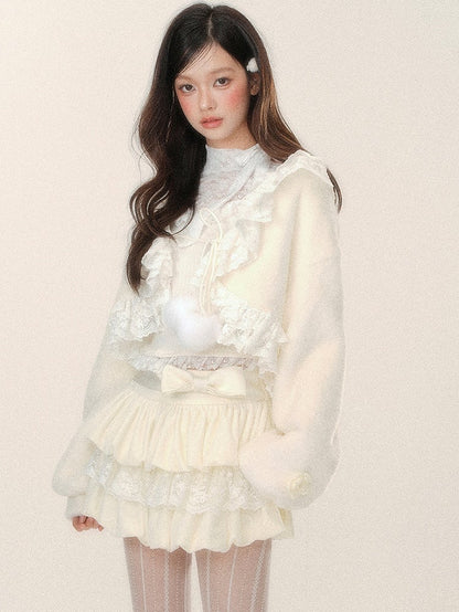 Aprikosenfarbener kurzer Plüsch-Cardigan mit selbstbindenden Trägern und Spitzenbesatz