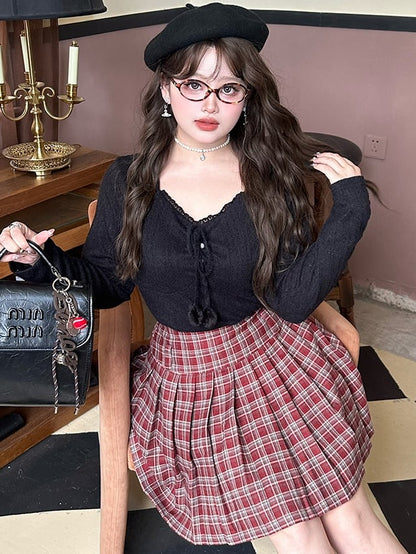 Plus Size Schwarzes Spitzentop mit V-Ausschnitt und Pompom-Akzenten, langen Ärmeln