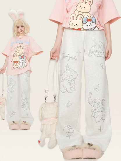 Graue, gerade geschnittene Jogginghose mit Welpen-Print