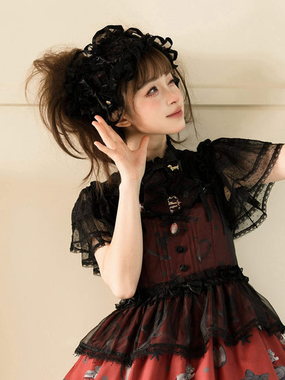 Schwarzes und rotes Haarband mit Schleife