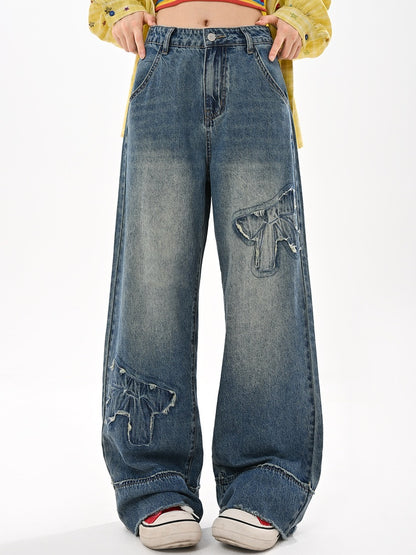 未加工ワイドレッグジーンズ ウエストリボンアップリケ ブルー ローヘム ヴィンテージ