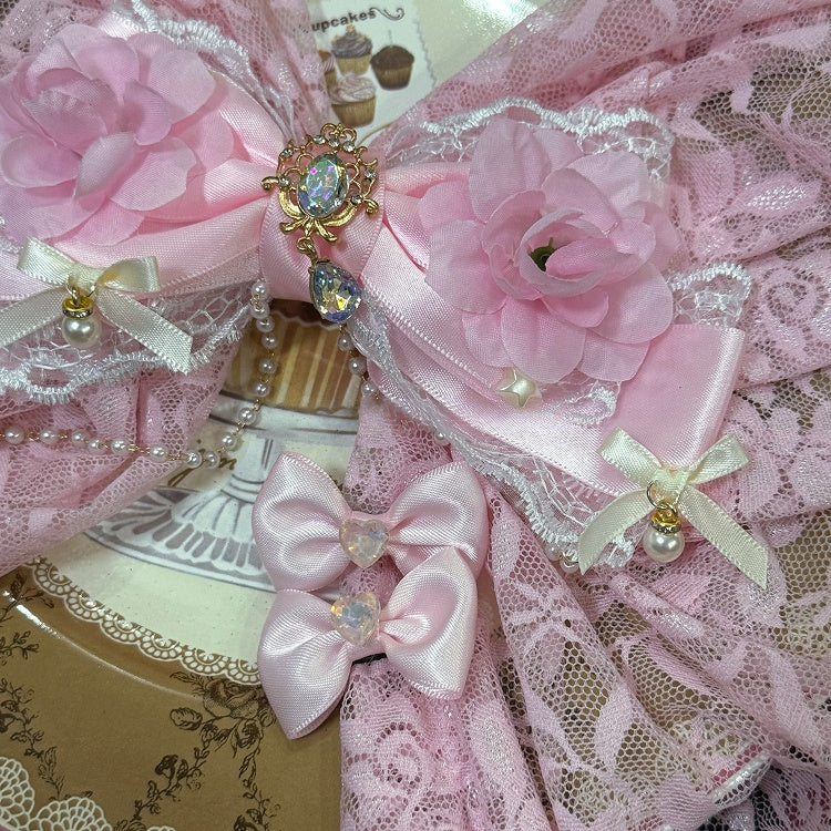 Haarspange mit Blumenanhänger und Strasssteinen in Rosa