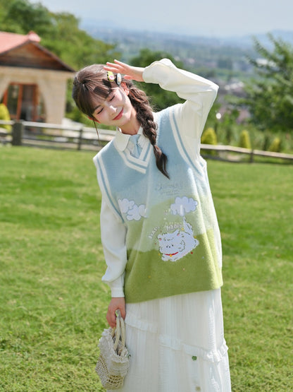 ブルー＆グリーングラデーションの子犬柄ニットベスト