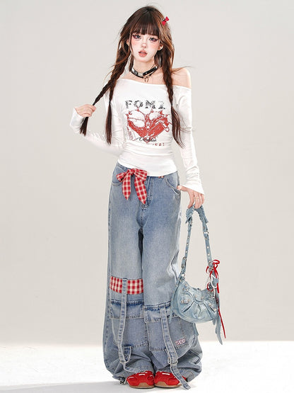 Schwarz/weißes Slim-Fit-Top mit asymmetrischem Ausschnitt und Herz