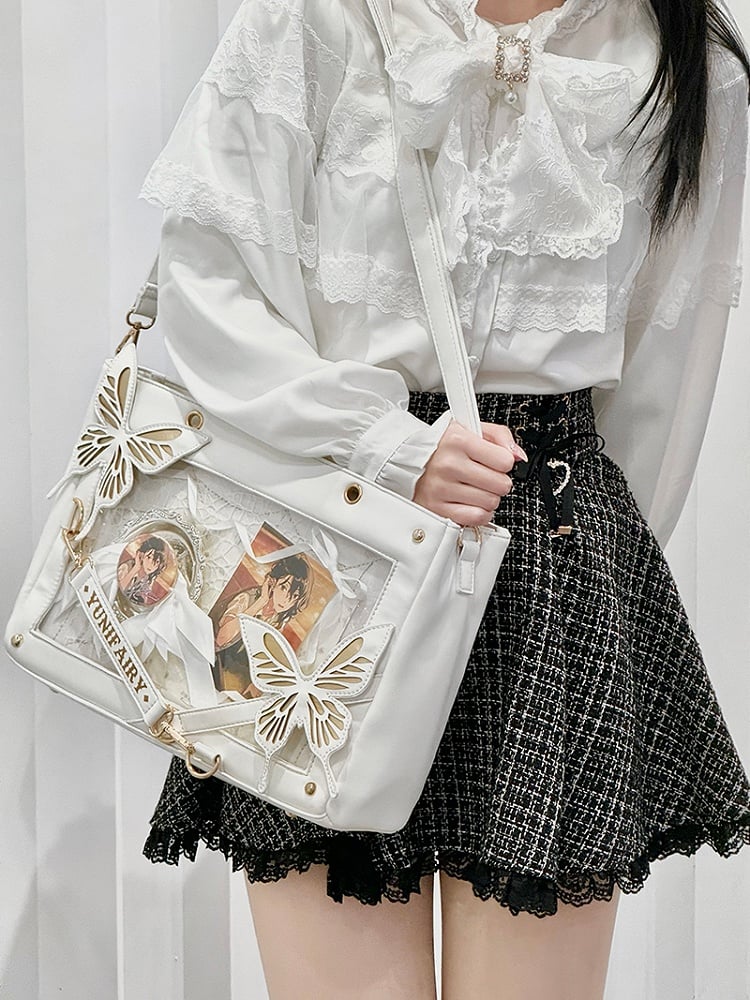 Abnehmbare Ita-Umhängetasche in Gold mit Schmetterlings- und Spinnennetz-Detail in Weiß