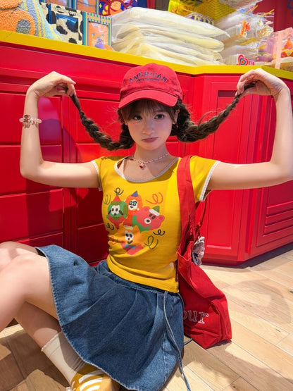 漫画プリントTシャツ ネックジンジャーレーストリムラウンド