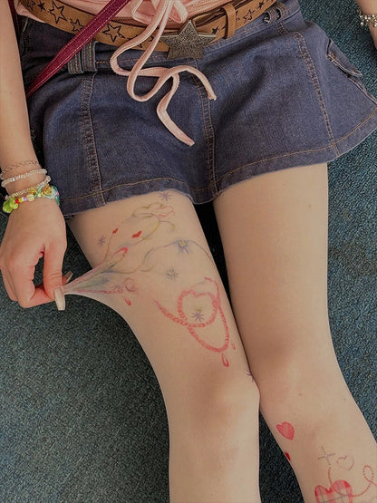 Tatouage imprimé cœur enjoué (style collants mignons)