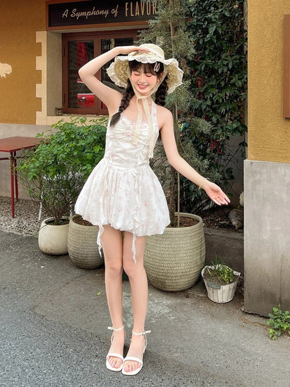 Süßes weißes Baskenkleid mit Puffärmeln und Neckholder und Blumenmuster