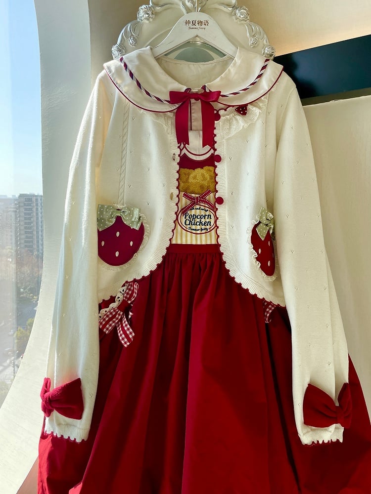 ホワイトの長袖ストロベリーアップリケカーディガン