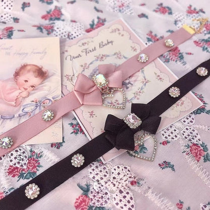 Choker with Rhinestone Black/Pink Pendant Heart Bow