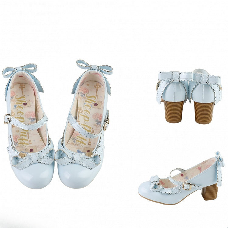 Janes Schleife verziert Mary Blue Top Herz bei