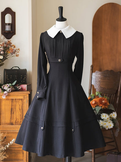 ブラックの取り外し可能なケープデザインのエレガントなレトロなスリミングドレス