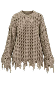 Brown distressed knit sweater laid flat