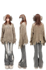 Front, side and back views of loose-knit sweater