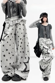 Gray wide-leg trousers with black star motifs