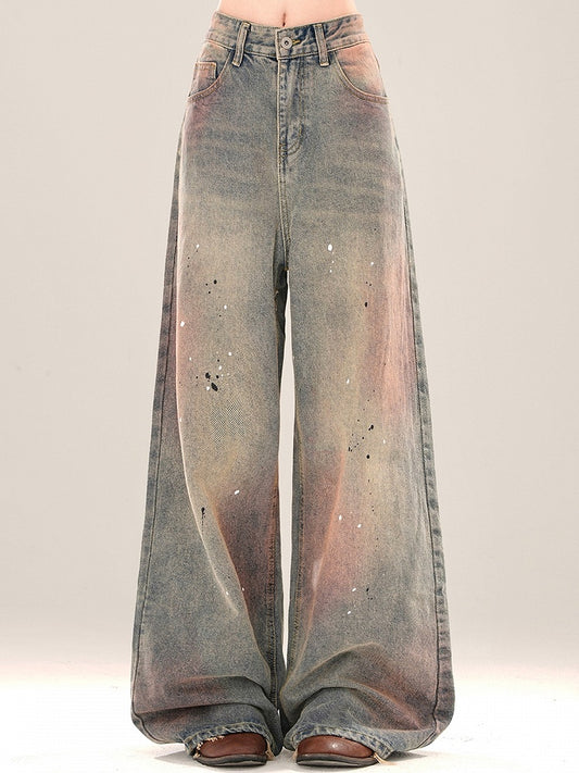 Jeans mit weitem Bein in verblasster Waschung und SplashInk-Details in Blau und Pink