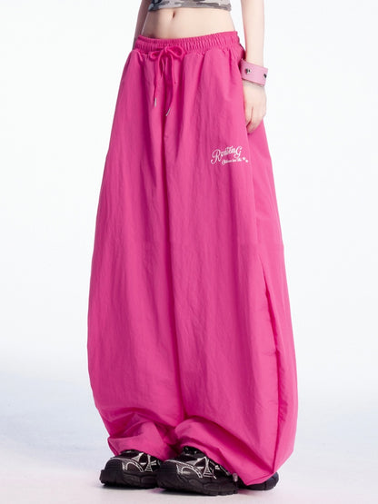 Rosarote Freizeithose mit weitem Bein und Kordelzug in der Taille und an den Bündchen